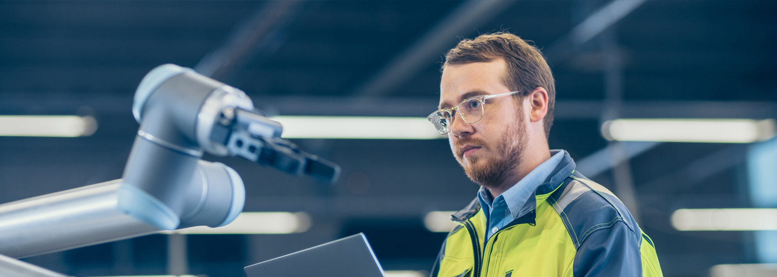 internet of things man working with robot