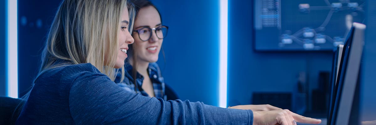 two women working on managed endpoint detection and response