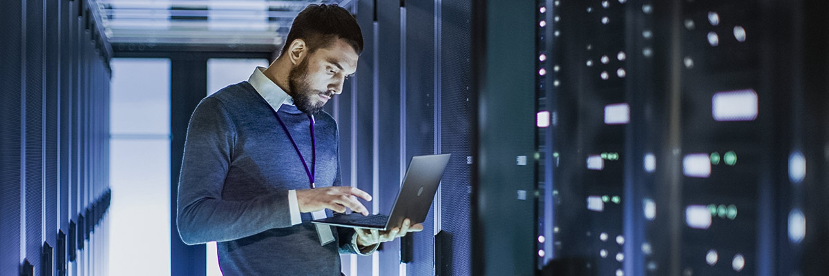 man reviewing data analytics from his laptop