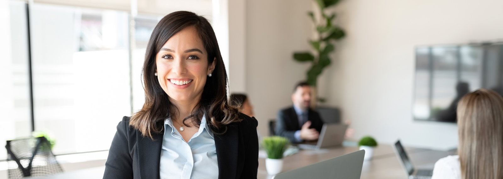 business woman smiling learning sap s/4hana in the public cloud