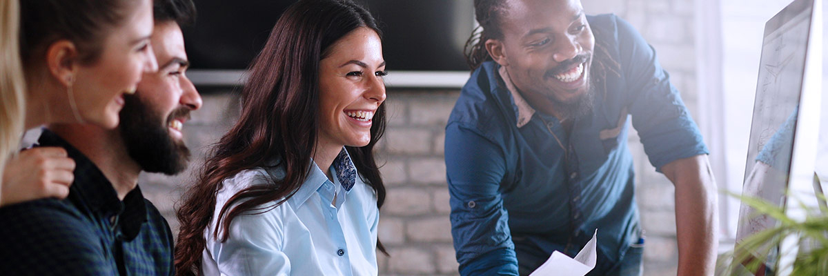 A group of people evaluating the support network and scalability of the chosen cloud migration services provider.