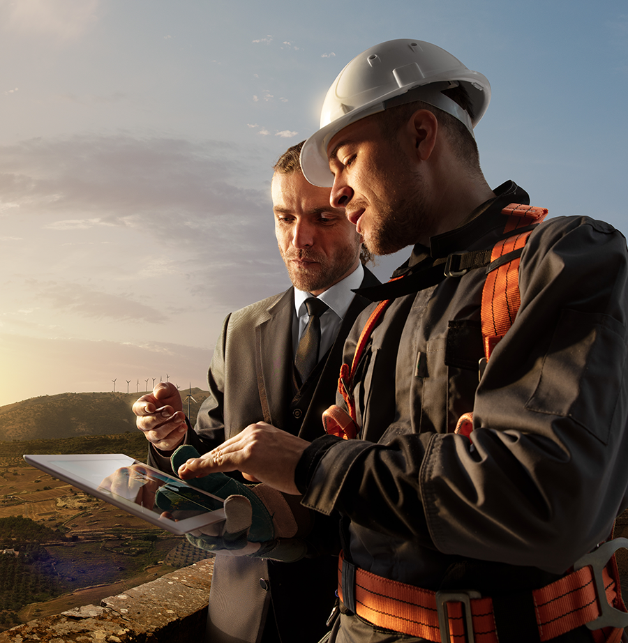 Two workers at a construction site.