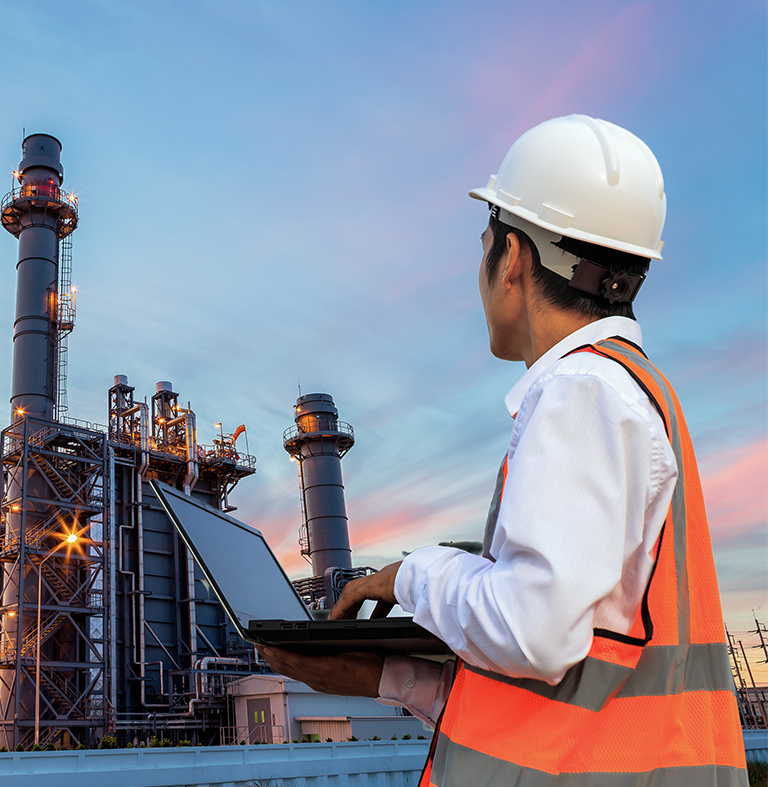 Man scanning a mining operations report.