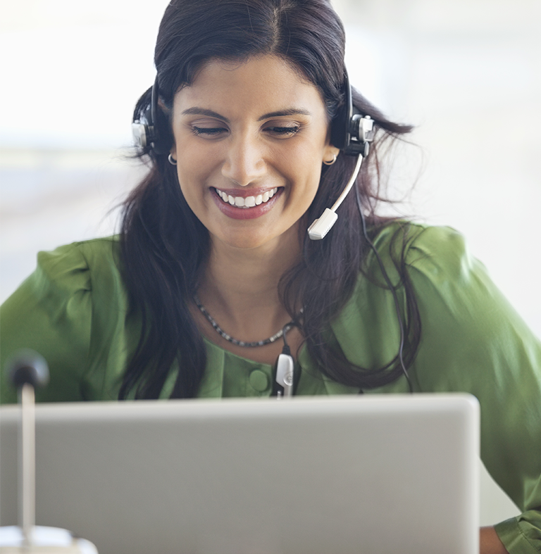 Woman wearing a headset providing an online professional service.