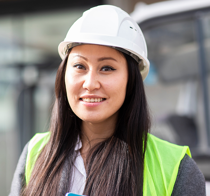 Woman working at building site