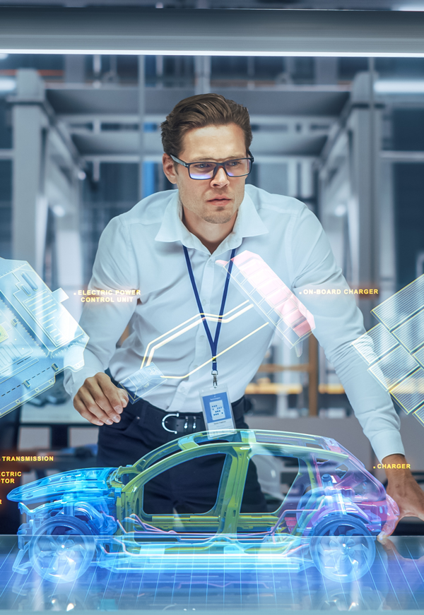 IT employee analyzing automotive plans