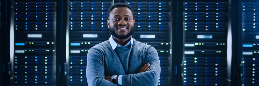 man in server room looking forward