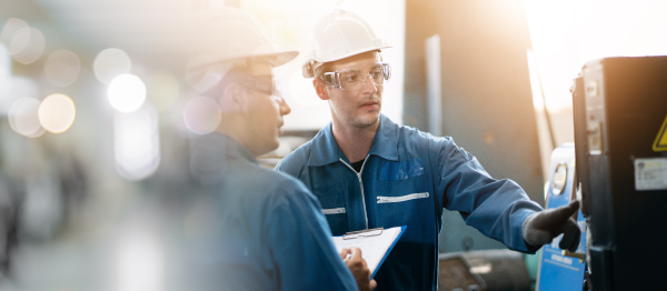 IT staff monitoring and troubleshooting equipment